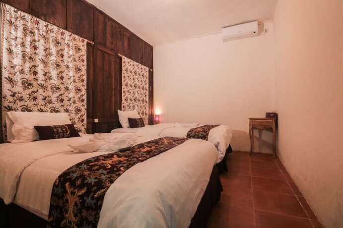 Imagen de la habitación del Hotel Balkondes Wringinputih. Foto 18