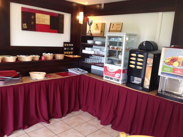 Imagen del bar/restaurante del Hotel Balladins Sarcelles. Foto 5