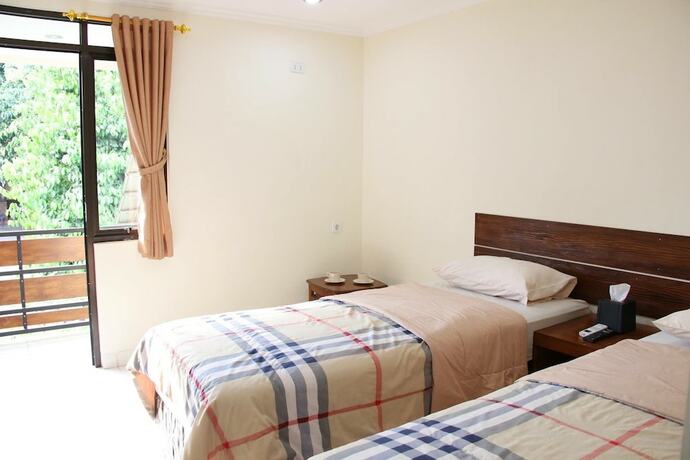 Imagen de la habitación del Hotel Bamboe Inn Homestay. Foto 11