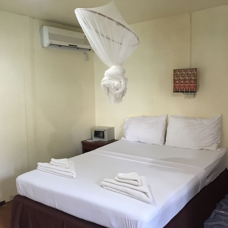 Imagen de la habitación del Hotel Bamboo Bay Resort. Foto 11