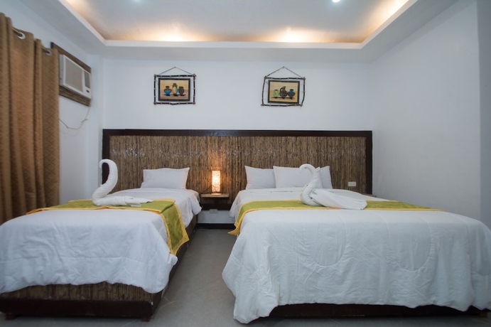 Imagen de la habitación del Hotel Bamboo Beach Resort. Foto 2