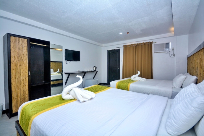Imagen de la habitación del Hotel Bamboo Beach Resort. Foto 5