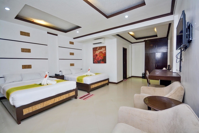 Imagen de la habitación del Hotel Bamboo Beach Resort. Foto 10