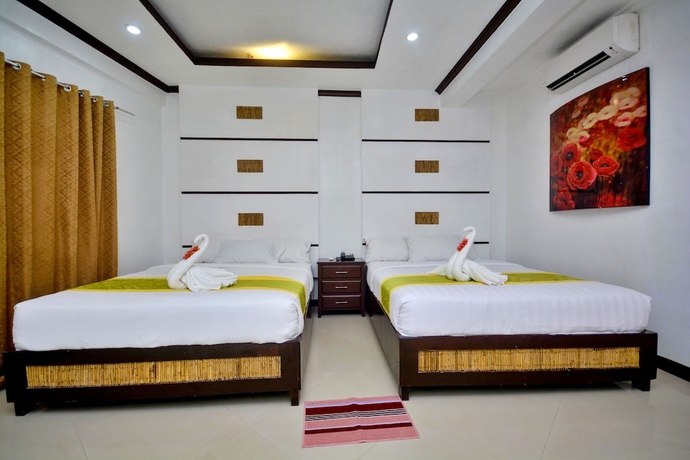 Imagen de la habitación del Hotel Bamboo Beach Resort. Foto 11