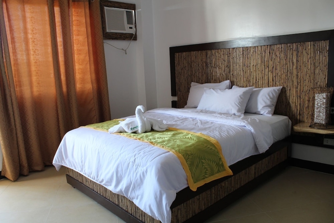 Imagen de la habitación del Hotel Bamboo Beach Resort. Foto 13