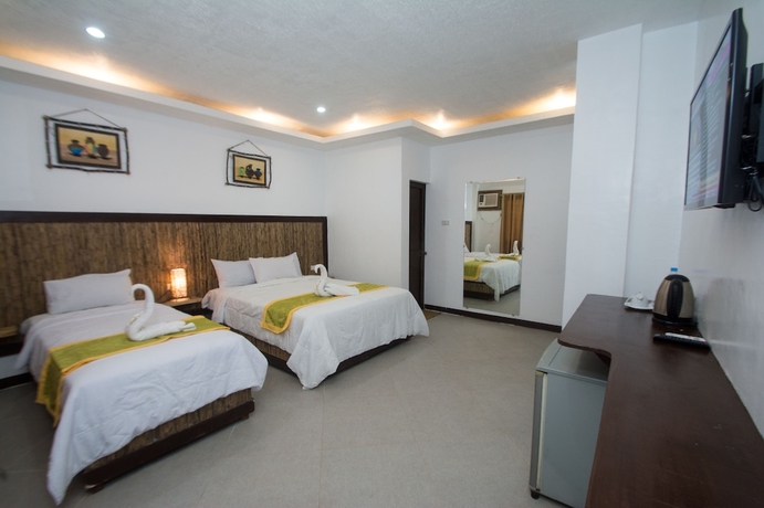 Imagen de la habitación del Hotel Bamboo Beach Resort. Foto 14