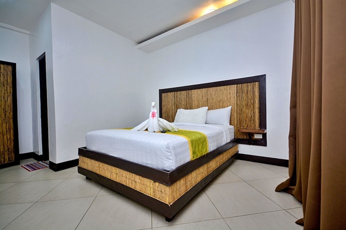 Imagen de la habitación del Hotel Bamboo Beach Resort. Foto 15