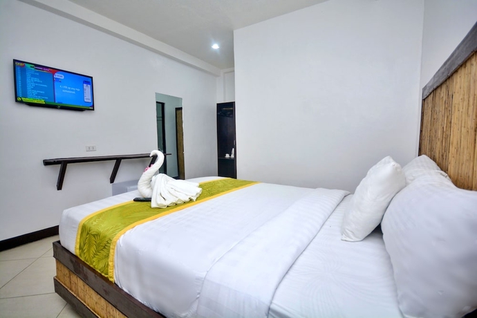 Imagen de la habitación del Hotel Bamboo Beach Resort. Foto 16