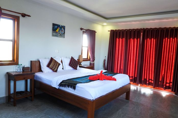 Imagen de la habitación del Hotel Bamboo Bungalow. Foto 7