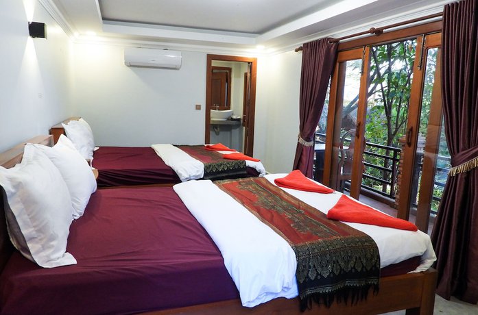 Imagen de la habitación del Hotel Bamboo Bungalow. Foto 16