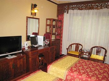 Imagen de la habitación del Hotel Bamboo Garden, Pekin. Foto 8