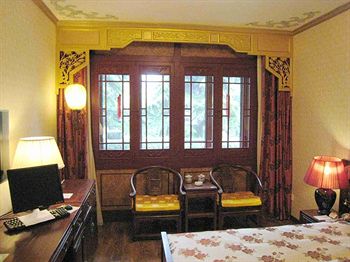 Imagen de la habitación del Hotel Bamboo Garden, Pekin. Foto 10