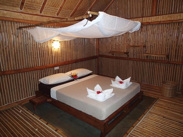 Imagen de la habitación del Hotel Bamboo Hideaway Resort. Foto 4