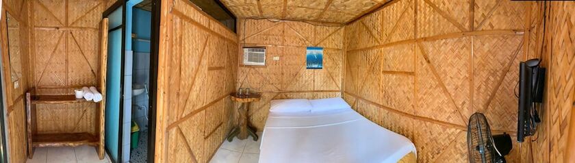 Imagen de la habitación del Hotel Bamboo House Beach Lodge and Restaurant. Foto 13
