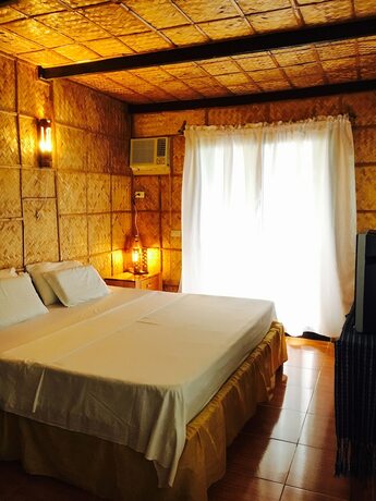 Imagen de la habitación del Hotel Bamboo House Beach Lodge and Restaurant. Foto 14
