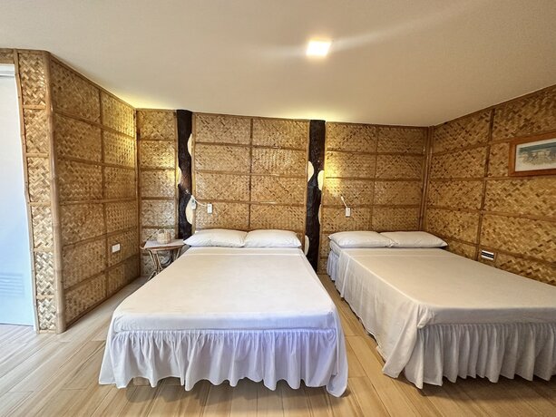 Imagen de la habitación del Hotel Bamboo House Beach Lodge and Restaurant. Foto 15