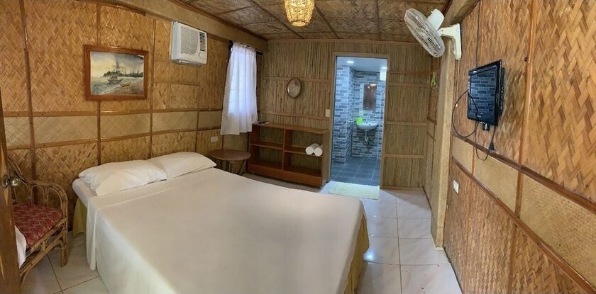 Imagen de la habitación del Hotel Bamboo House Beach Lodge and Restaurant. Foto 16