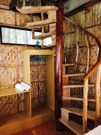 Imagen de la habitación del Hotel Bamboo House Beach Lodge and Restaurant. Foto 17