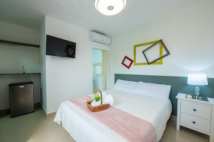 Imagen de la habitación del Hotel Bamboo House. Foto 15