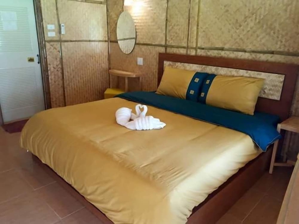 Imagen de la habitación del Hotel Bamboo House Kanchanaburi. Foto 6