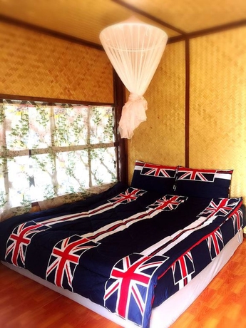 Imagen de la habitación del Hotel Bamboo House Kanchanaburi. Foto 9