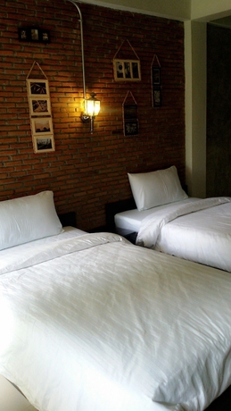 Imagen de la habitación del Hotel Bamboo House Kanchanaburi. Foto 12
