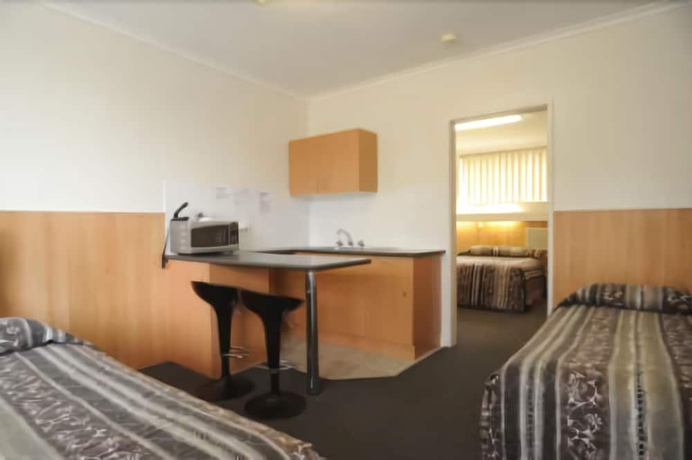 Imagen de la habitación del Hotel Bamboo Motor Inn. Foto 10