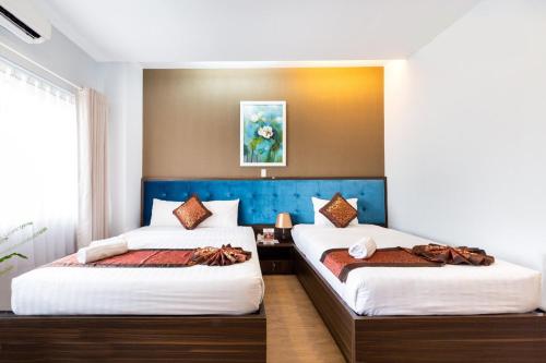 Imagen de la habitación del Hotel Bamboo Saigon. Foto 11