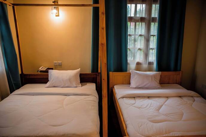 Imagen de la habitación del Hotel Bamboo Village, ARUSHA. Foto 10