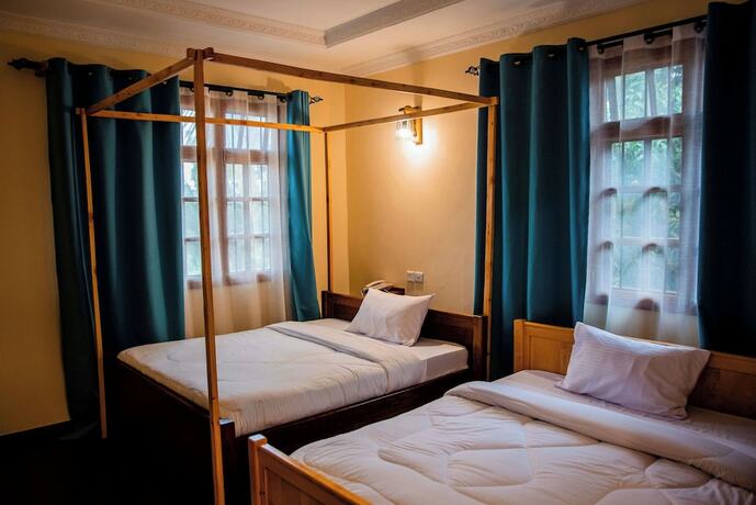 Imagen de la habitación del Hotel Bamboo Village, ARUSHA. Foto 11
