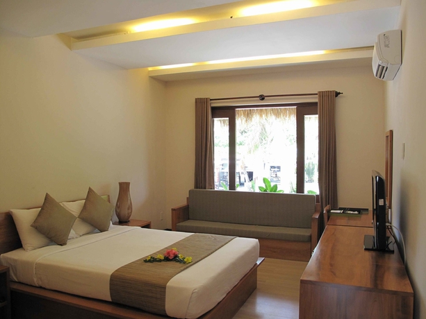 Imagen de la habitación del Hotel Bamboo Village Beach Resort and Spa. Foto 9