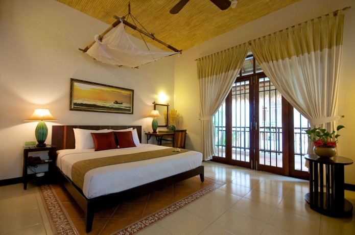 Imagen de la habitación del Hotel Bamboo Village Beach Resort and Spa. Foto 13