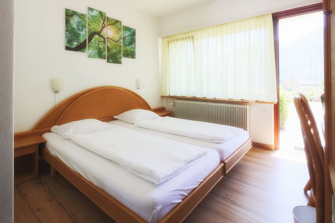 Imagen de la habitación del Hotel Bamboohouse Motel Riazzino. Foto 7