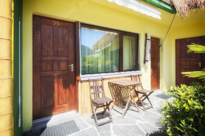 Imagen de la habitación del Hotel Bamboohouse Motel Riazzino. Foto 9