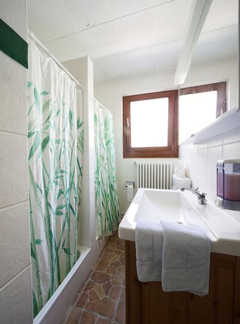 Imagen de la habitación del Hotel Bamboohouse Motel Riazzino. Foto 10