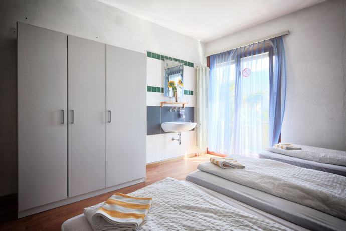 Imagen de la habitación del Hotel Bamboohouse Motel Riazzino. Foto 12