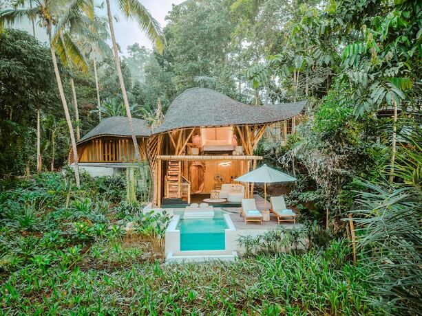 Imagen de la habitación del Hotel Bambootel Sawah View. Foto 17