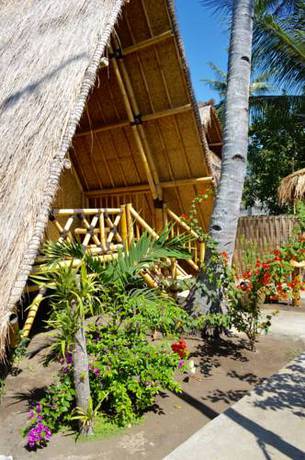 Imagen de la habitación del Hotel Bambu Cottages. Foto 1