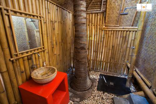 Imagen de la habitación del Hotel Bambu Cottages. Foto 2
