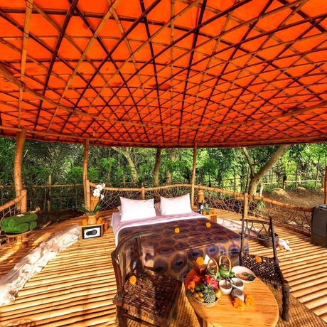 Imagen de la habitación del Hotel Bambu Indah Resort. Foto 2