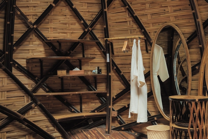 Imagen de la habitación del Hotel Bambu Indah Resort. Foto 8