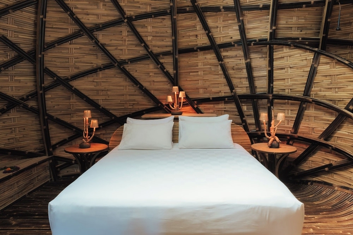 Imagen de la habitación del Hotel Bambu Indah Resort. Foto 9