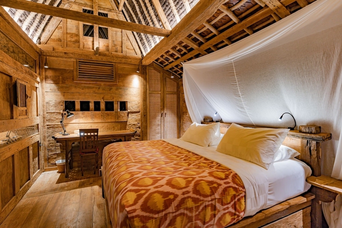 Imagen de la habitación del Hotel Bambu Indah Resort. Foto 11