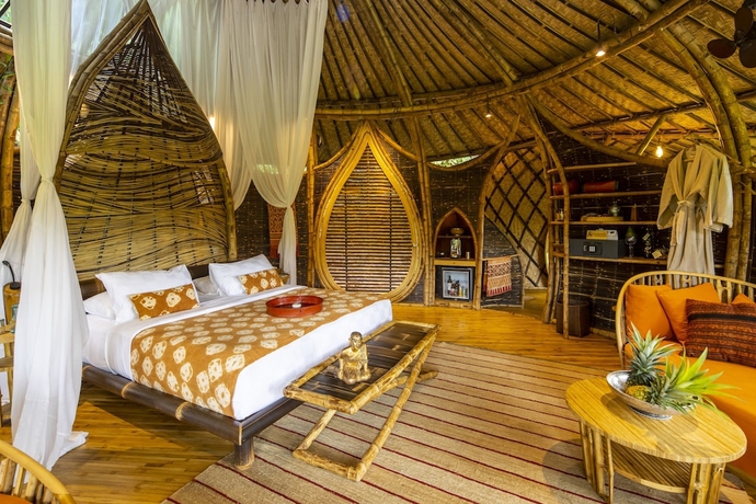 Imagen de la habitación del Hotel Bambu Indah Resort. Foto 12