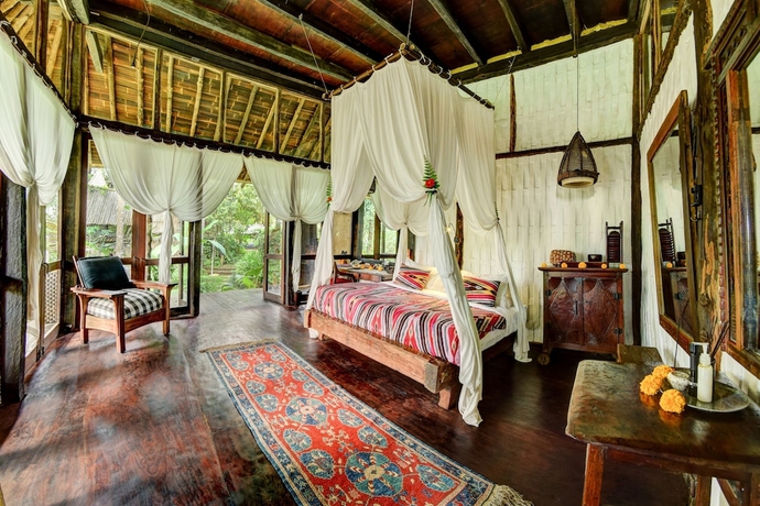 Imagen de la habitación del Hotel Bambu Indah Resort. Foto 13