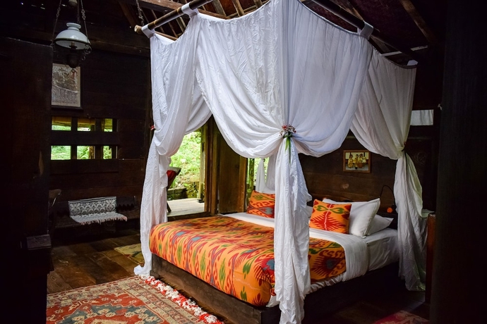 Imagen de la habitación del Hotel Bambu Indah Resort. Foto 15