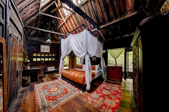 Imagen de la habitación del Hotel Bambu Indah Resort. Foto 16