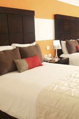 Imagen de la habitación del Hotel Bambu Suites - Near Quinta Avenida. Foto 4