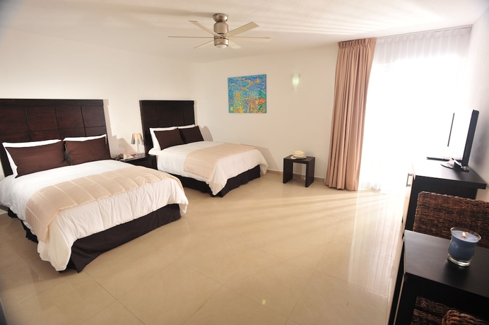 Imagen de la habitación del Hotel Bambu Suites - Near Quinta Avenida. Foto 7