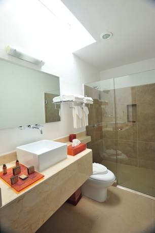 Imagen de la habitación del Hotel Bambu Suites - Near Quinta Avenida. Foto 8